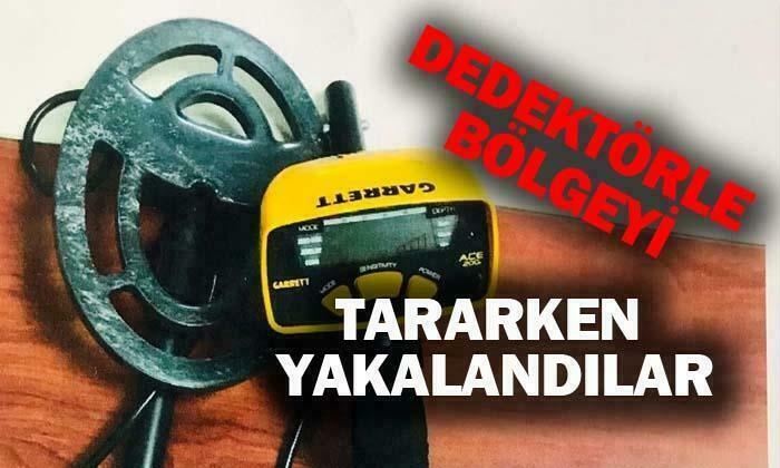 Dedektörle bölgeyi tararken yakalandılar